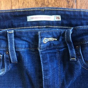 Levi’s dark high rise jeans